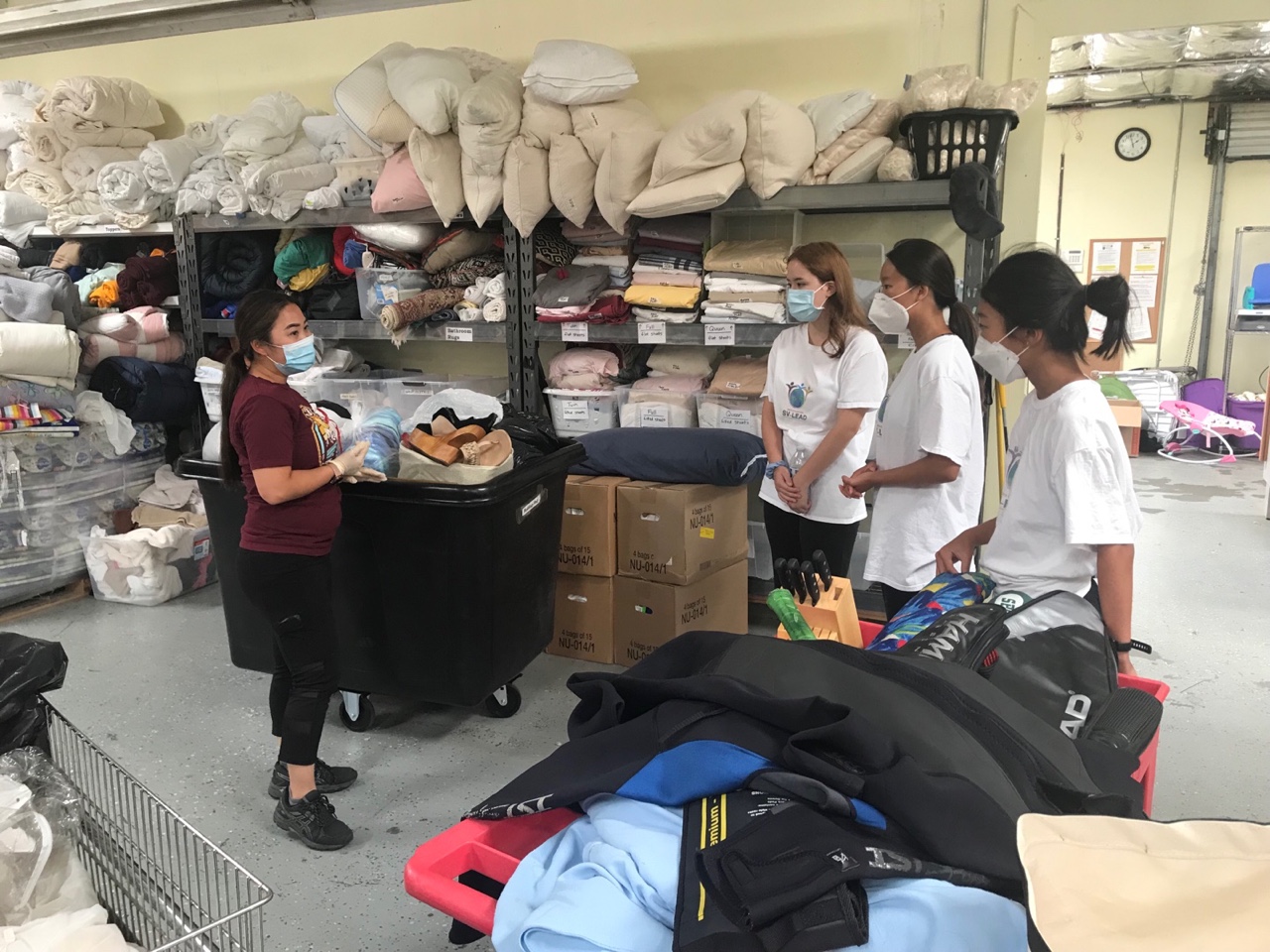 Volunteers sorting donations