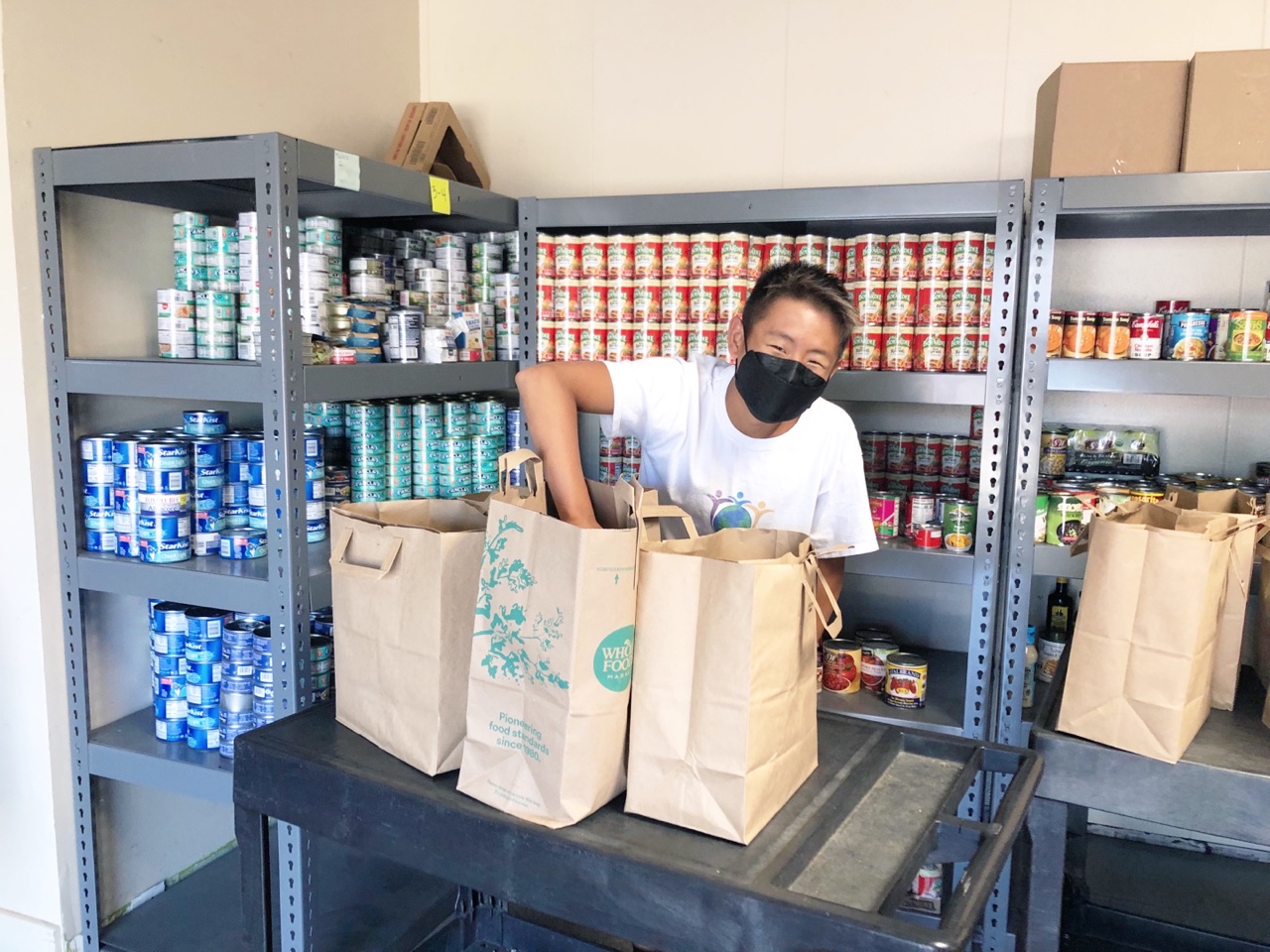 Packing groceries at a food bank